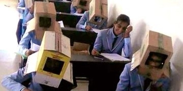 öğrencilerin kafasına karton geçirip sınav yapmak