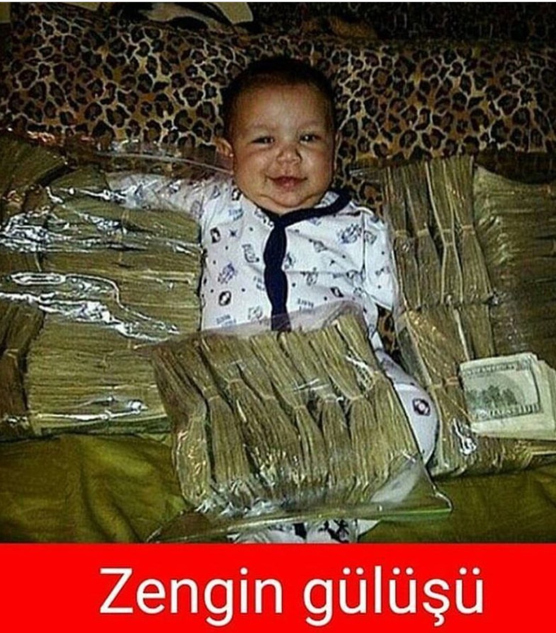 Смешная фотография ребенка с деньгами